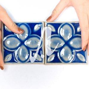 Gạch điểm 3D 10x10 hoa 4 cánh xanh coban