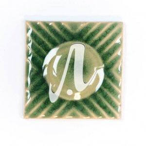 Gạch điểm 3D chấm tròn xanh lá đậm 10x10