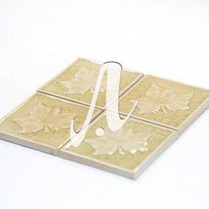 Gạch điểm 3D lá phong trắng kem 10x10