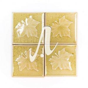 Gạch điểm 3D lá phong trắng kem 10x10